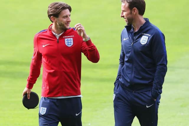 Adam Lallana with England manager Gareth Southgate