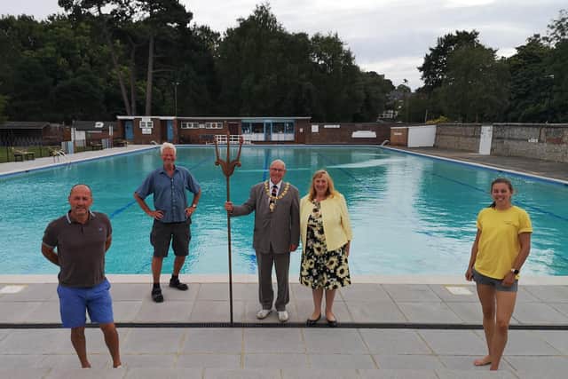 Phil Ransley, Conrad Ryle, the mayor with his partner and lifeguard Steph Hollis at Pells Pool in Lewes