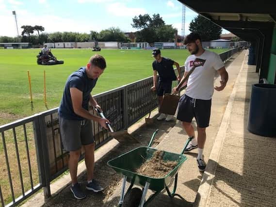 Rocks players help get Nyewood Lane ready for fans to return - whenever that may be