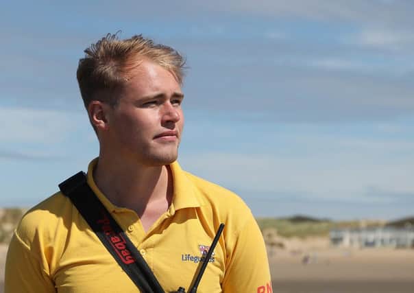 RNLI lifeguard Joel. Picture by Kt Bruce SUS-200729-103745001