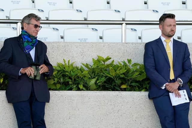 Two of the few... it was another day when only staff, media and some owners were allowed into Goodwood - but that changes on Saturday / Picture: Alan Crowhurst, Getty
