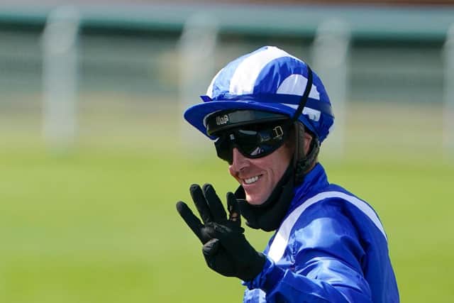 Four up! Jim Crowley shows his delight at another record-breaking King George Stakes win with Battaash / Picture: Alan Crowhurst, Getty