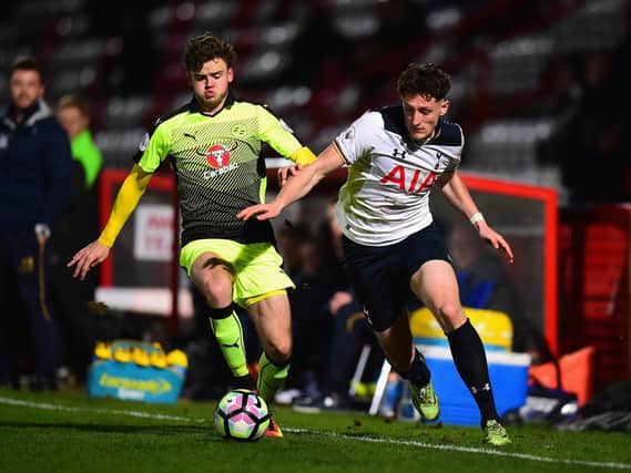 Tyler Frost, left, in Reading action against Spurs U23s / Picture: Getty