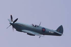 NHS Spitfire flies over Worthing. Picture: Eddie Mitchell SUS-200108-152930001