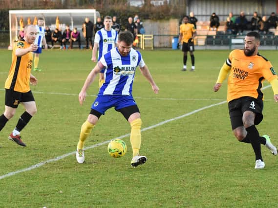 Lloyd Cotton in action for Haywards Heath / Picture: Grahame Lehkyj