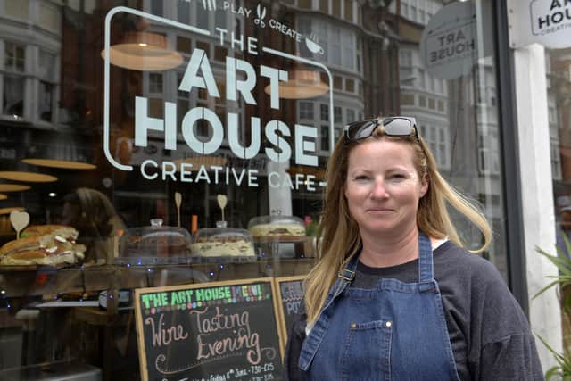Lucy Hancock outside her Art House Creative Cafe in Grove Road, Eastbourne (Photo by Jon Rigby)