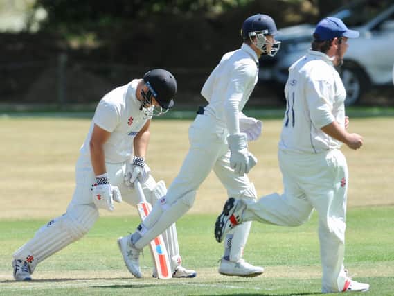 A wicket falls in the Findon-Littlehampton game / Picture: Stephen Goodger