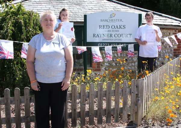 Frances Urquart, Emily Maynard and Ashley Hobbs of Red Oaks care home in Henfield SUS-200508-141306001
