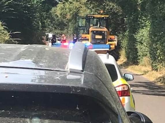 A car and a tractor were involved in the collision. Photo courtesy of Adrian Murphy (@adrianwsfrs)