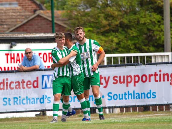 Chi City celebrate one of their two goals against Worthing / Picture: Neil Holmes