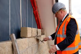 Boris Johnson at a building site last week promoting the government's new planning reforms (Photo by Phil Noble - WPA Pool/Getty Images)