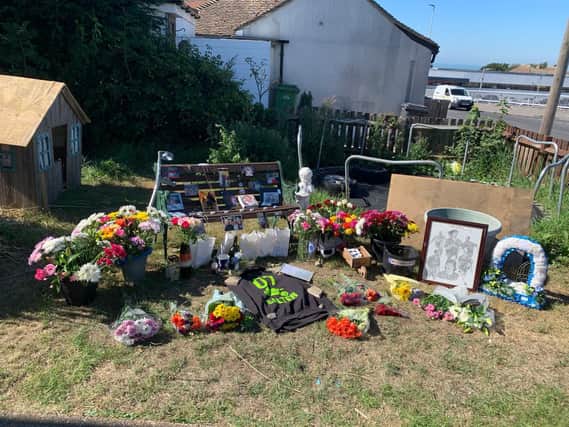 Floral tributes left outside Cindy Salter's house