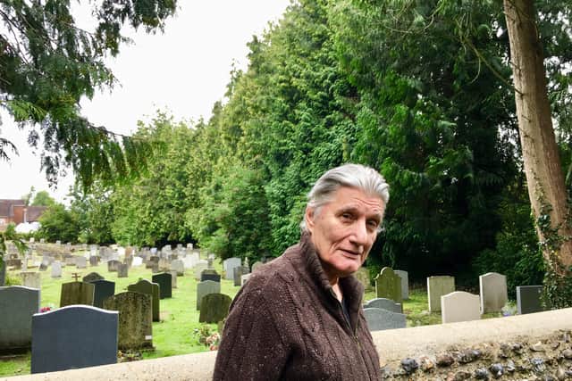 John Gibson from The Thatchway, Angmering, in front of the 45 trees in the St Margaret's Church graveyard in 2018