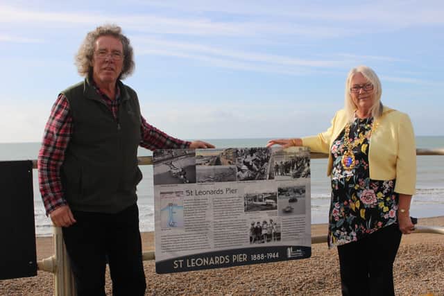 Judy Rogers and local historian Steve Peak unveiling the display board in October 2017