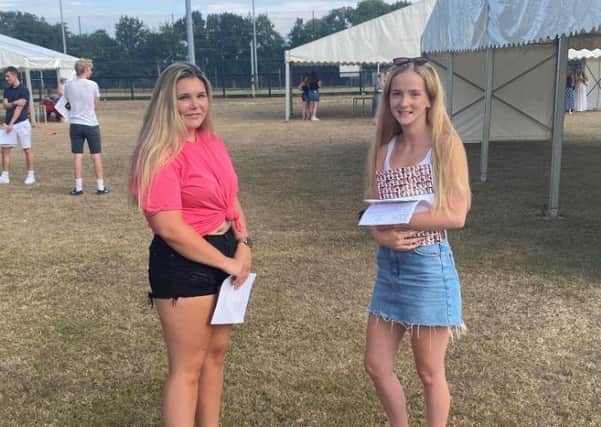 Erin Cooper and Cat Large collect their results
