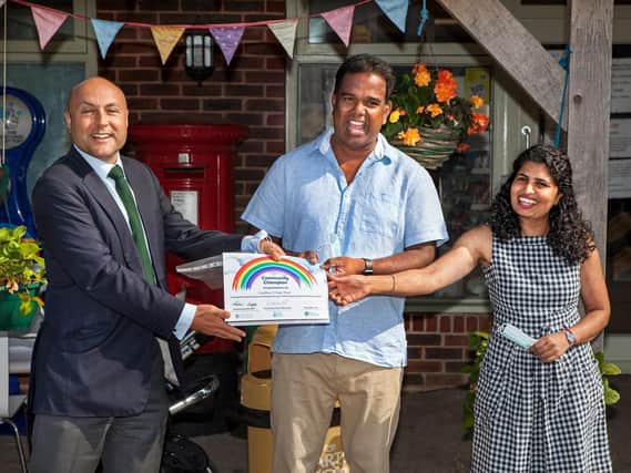 Store owners Thievandiram and Vasukee Jeevathasan, known locally as Jeeva and Vasu, were handed the award by Andrew Griffith, MP for Arundel and South Downs, on Saturday morning. Photo: Colin Barker