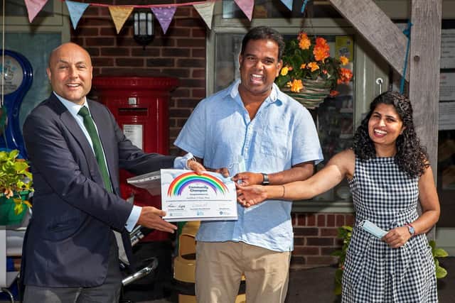 Store owners Thievandiram and Vasukee Jeevathasan, known locally as Jeeva and Vasu, were handed the award by Andrew Griffith, MP for Arundel and South Downs, on Saturday morning. Photo: Colin Barker