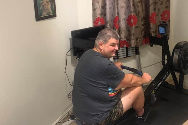 Pierre Towers on his rowing machine