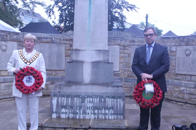 Wreaths laid by council chairman councillor Karen Burgess and Jeremy Quin MP
