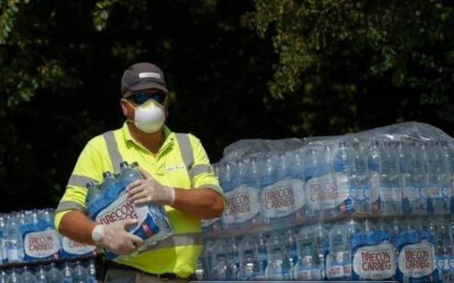 Residents had to resort to bottled water during water shortages in Mid Sussex this month SUS-200814-152017001