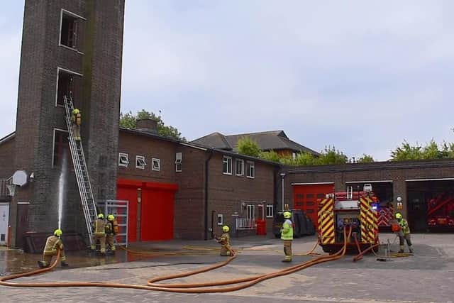 Crawley firefighters demonstrating a tower rescue
