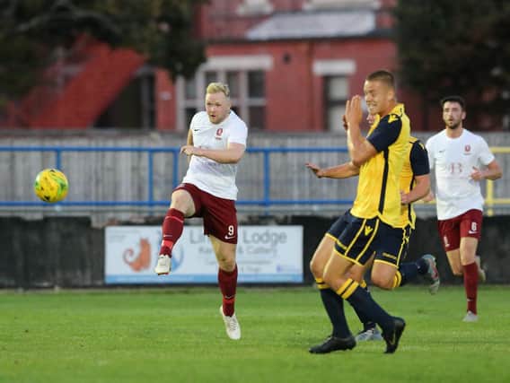 Ben Pope fires goalwards in Hastings' friendly draw at Eastbourne Town / Picture: Scott White