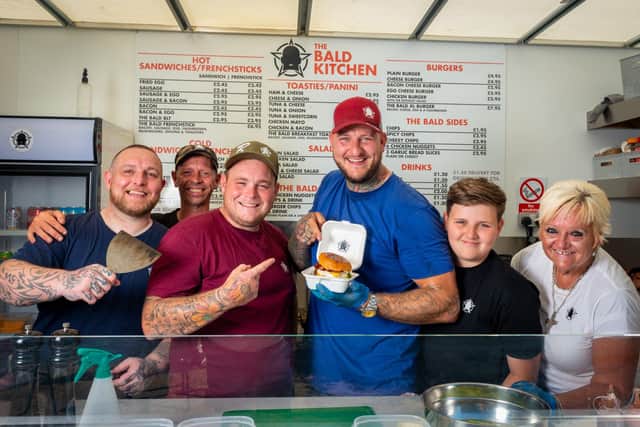 Social media stars, The Bald Builders, AKA Sam Hughes from Bognor Regis and Brad Hanson from Littlehampton, launch their very own food truck, The Bald Kitchen. In Pic: The Bald Builders, Sam and Brad, with members of The Bald Kitchen team. Picture: Scott Ramsey
