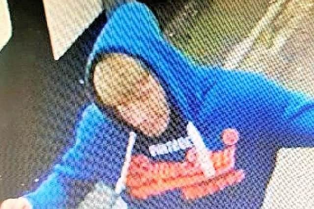 Police investigating a street robbery in Brighton city centre want to trace this man
