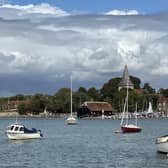 Bosham stands on a small peninsula between two tidal creeks at the eastern end of Chichester Harbour