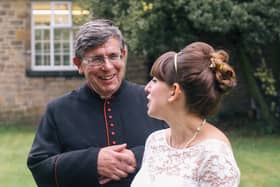 Hilary with her dad, Rev Canon Philip Cunningham, on her wedding day at his church in Gosforth, Newcastle upon Tyne