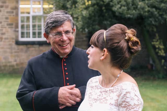 Hilary with her dad, Rev Canon Philip Cunningham, on her wedding day at his church in Gosforth, Newcastle upon Tyne