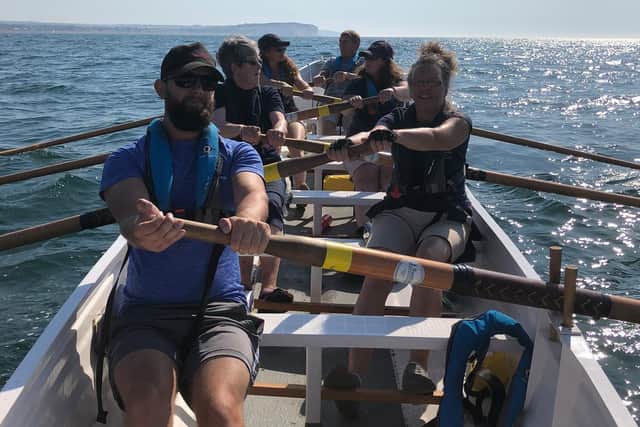 Rowers out at sea