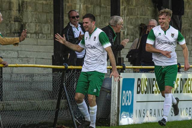 James Crane celebrates a goal at Folkestone last season / Picture: Tommy McMillan