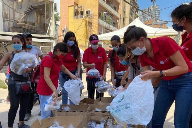 Triumphant Mercy distributing food in Beirut