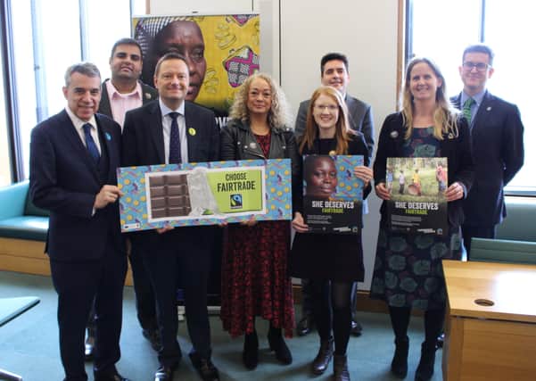 Huw Merriman MP with members of the All Party Parliamentary Group for Fairtrade SUS-200220-100357001