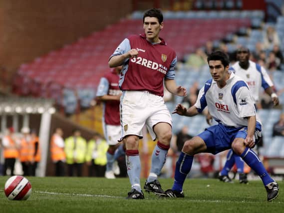 Gareth Barry in action for Aston Villa, playing against Pompey in 2007