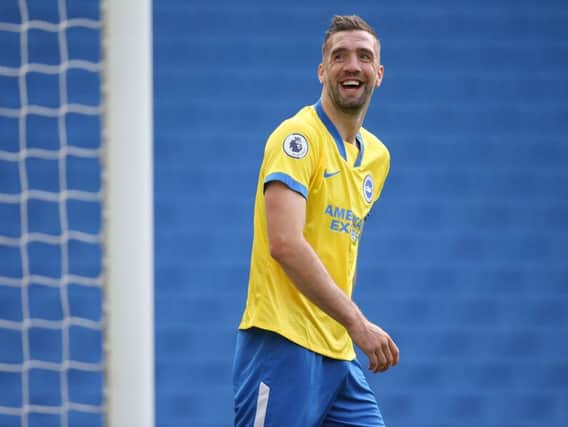 Shane Duffy enjoys a joke with the Albion fans during their 1-1 friendly draw against Chelsea