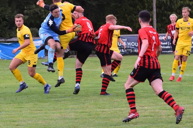 Action from AFC Uckfield Town v Little Common. Picture by Mike Skinner