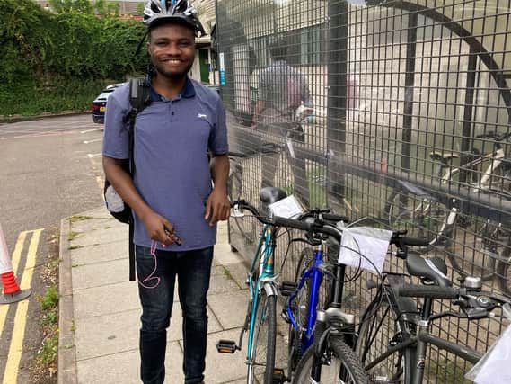 Chinedu Ikedinma, a staff nurse at Conquest Hospital, with his new bicycle