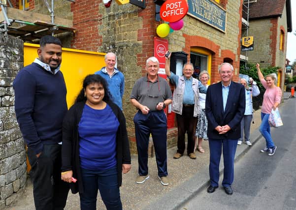 Kirish and Ricky Mahabevan. Easebourne Post Office reopens. Pic Steve Robards SR2009081 SUS-200809-171834001