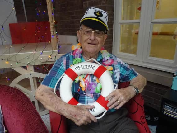 Frank Gearing, a resident at RMBI Home Barford Court, enjoying the virtual cruise.