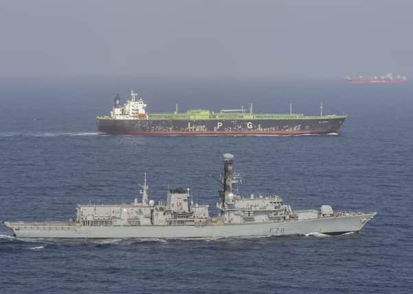 HMS Kent accompanies British shipping through the Strait of Hormuz. Credit: LPhot Dan Rosenbaum, HMS Kent PPP-190930-163337003