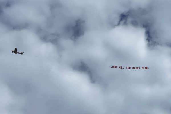 Joshua Allies, 25, proposed to Jade Clark, 25, on West Beach in Littlehampton on Friday, September 4, with a message in the sky