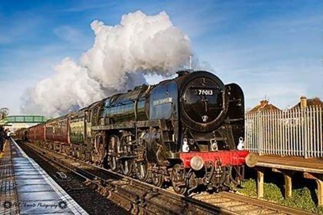 Thanks to Phil Clements for this fantastic photo of the Oliver Cromwell pulling the Christmas Sussex Belle into Eastbourne on December 12. Here, the locomotive is steaming through Hampden Park station