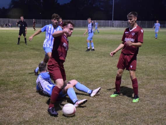 Action from Little Common v AFC Uckfield on Tesday night. Picture by Mike Skinner