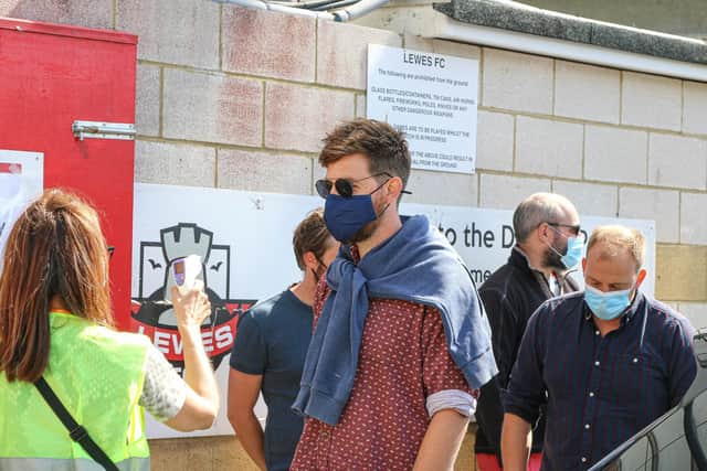 Fans get temperature checks on the way into the Dripping Pan for the Lewes Women v London Bees friendly / Picture: James Boyes