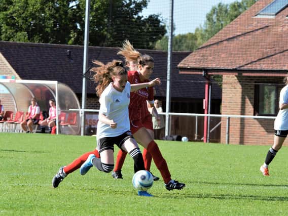 Worthing's Beth Kincaid being fouled