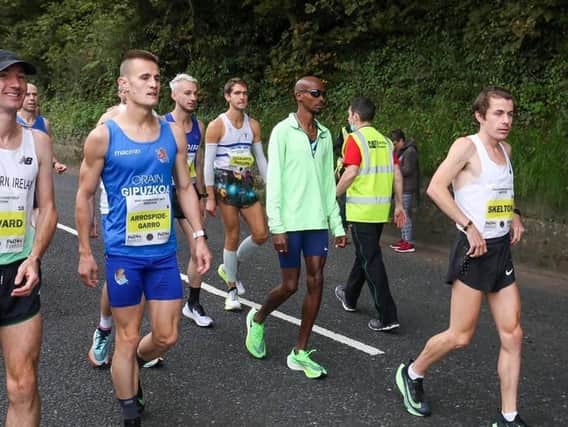 Ross Skelton (far right of picture), Sir Mo Farah and others head to the start