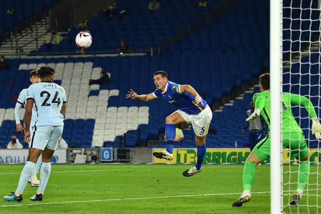 Lewis Dunk misses a golden chance for Brighton during the second half when the score was 2-1