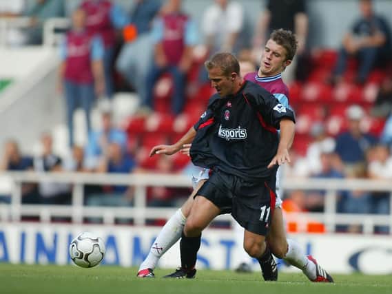 John Robinson in his Charlton days, up against Michael Carrick of West Ham / Picture: Getty